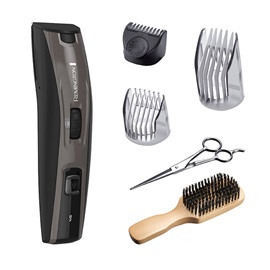 Grooming kit with trimmer, length combs, scissors, and beard brush.