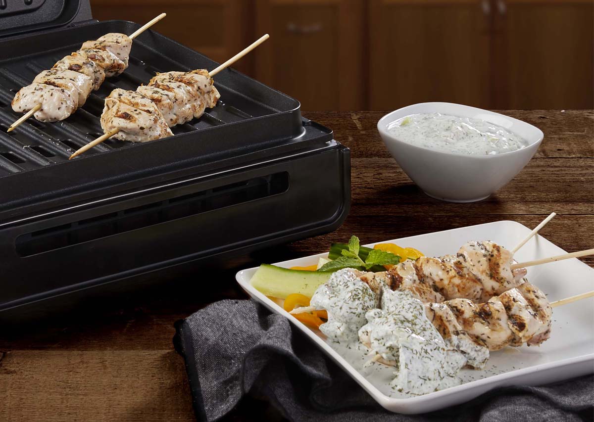 Greek chicken kabobs with tzatziki sauce and grill