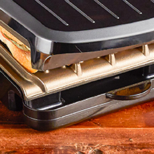 2-Serving Classic Plate Electric Indoor Grill And Panini Press with removeable drip tray. Black with bronze plates - GRS040BZ